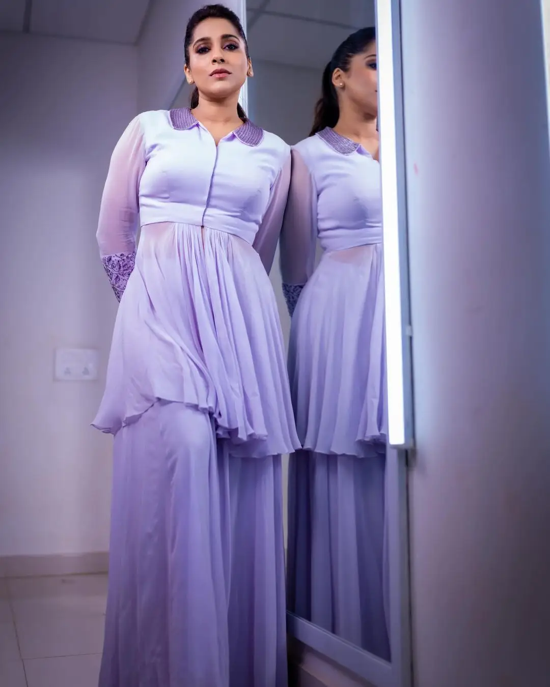 ETV Anchor Rashmi Gautam Photos In Violet Gown